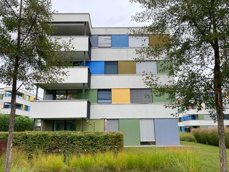 Apartment building with colorful paint scheme
