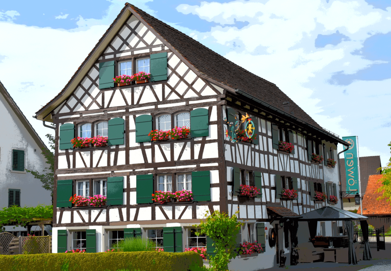 Half-timbered house with green shutters and colorful flower boxes
