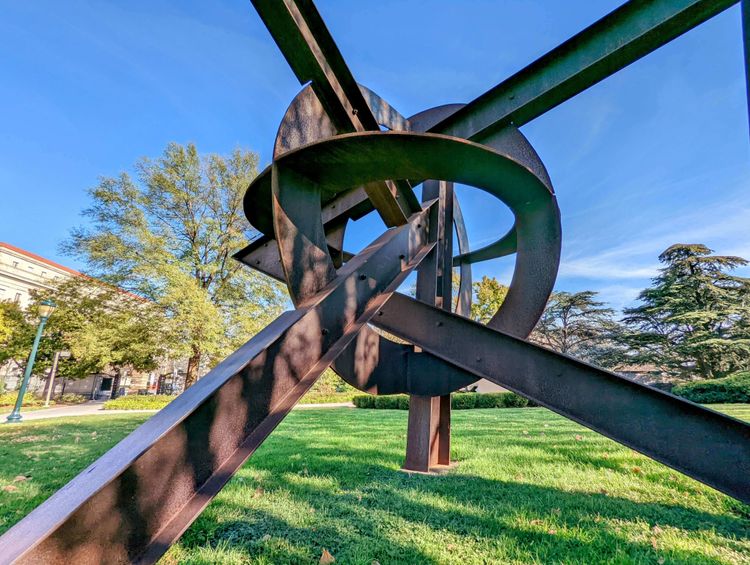 Metal sculpture of a knot made of steel beams