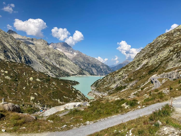 Swiss mountains with lake in the valley. Would you fill this alpine valley with trash?