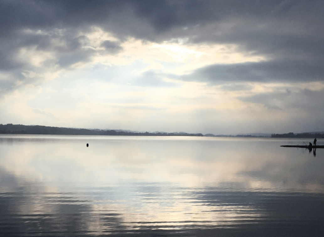 Lake with clouds reflected and indirect light - Moral Letters to Lucilius