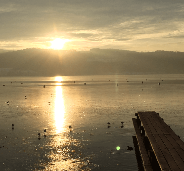 Sun shining over a frozen lake