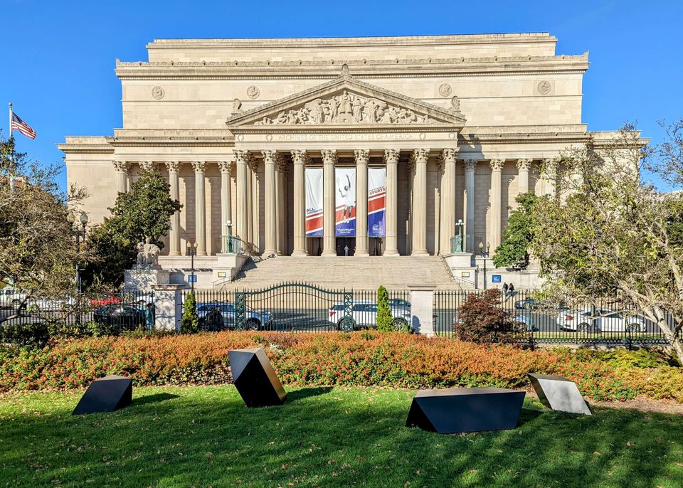 Facade of the National Archives Museum in Washington, DC, seen from the edge of the National Gallery sculpture garden