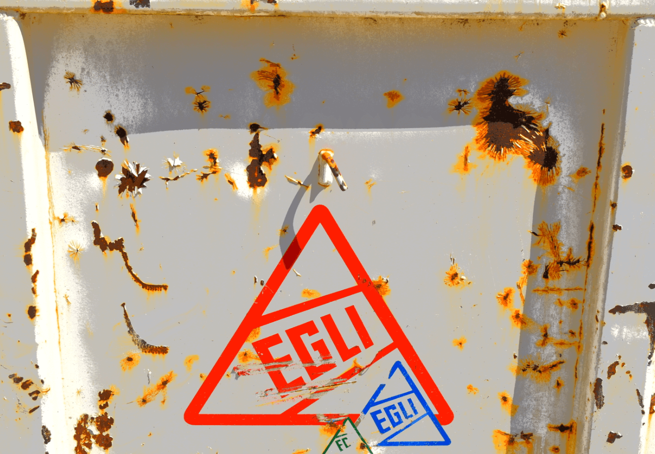 Rusty metal panel with logo EGLI in red, blue, and green triangles