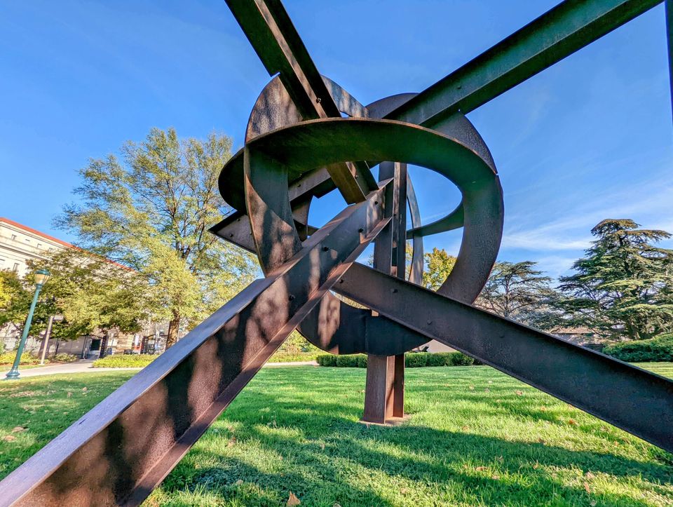Metal sculpture of a knot made of steel beams